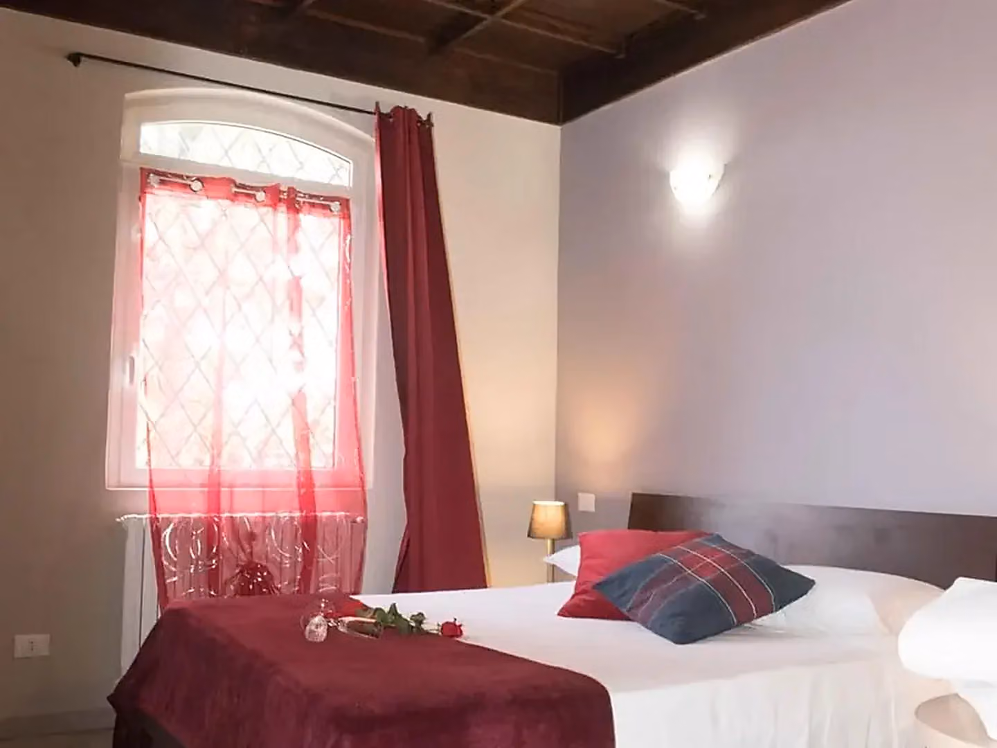 Una camera da letto del B&B Barbettini